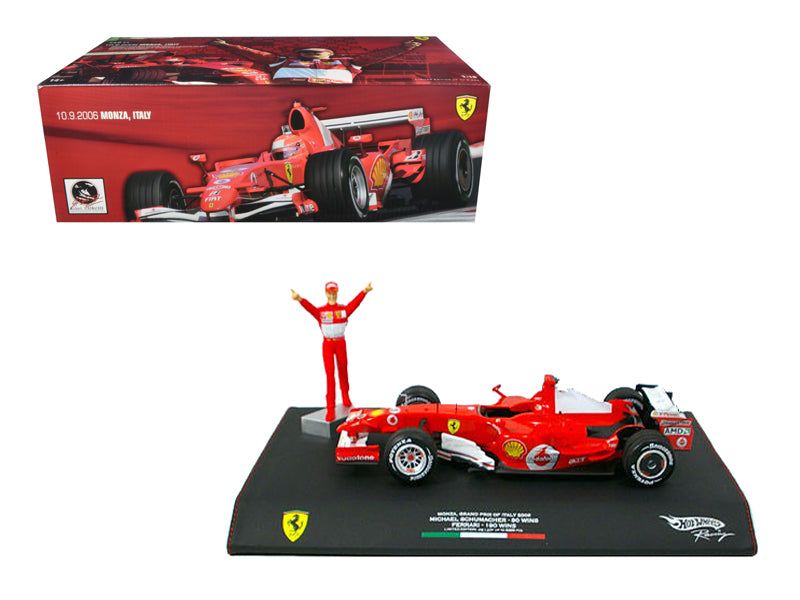 Ferrari #5 Michael Schumacher Winner F1 Formula One Monza Italian GP (2006) with Michael Schumacher Figurine 1/18 Diecast Model Car by Hot Wheels