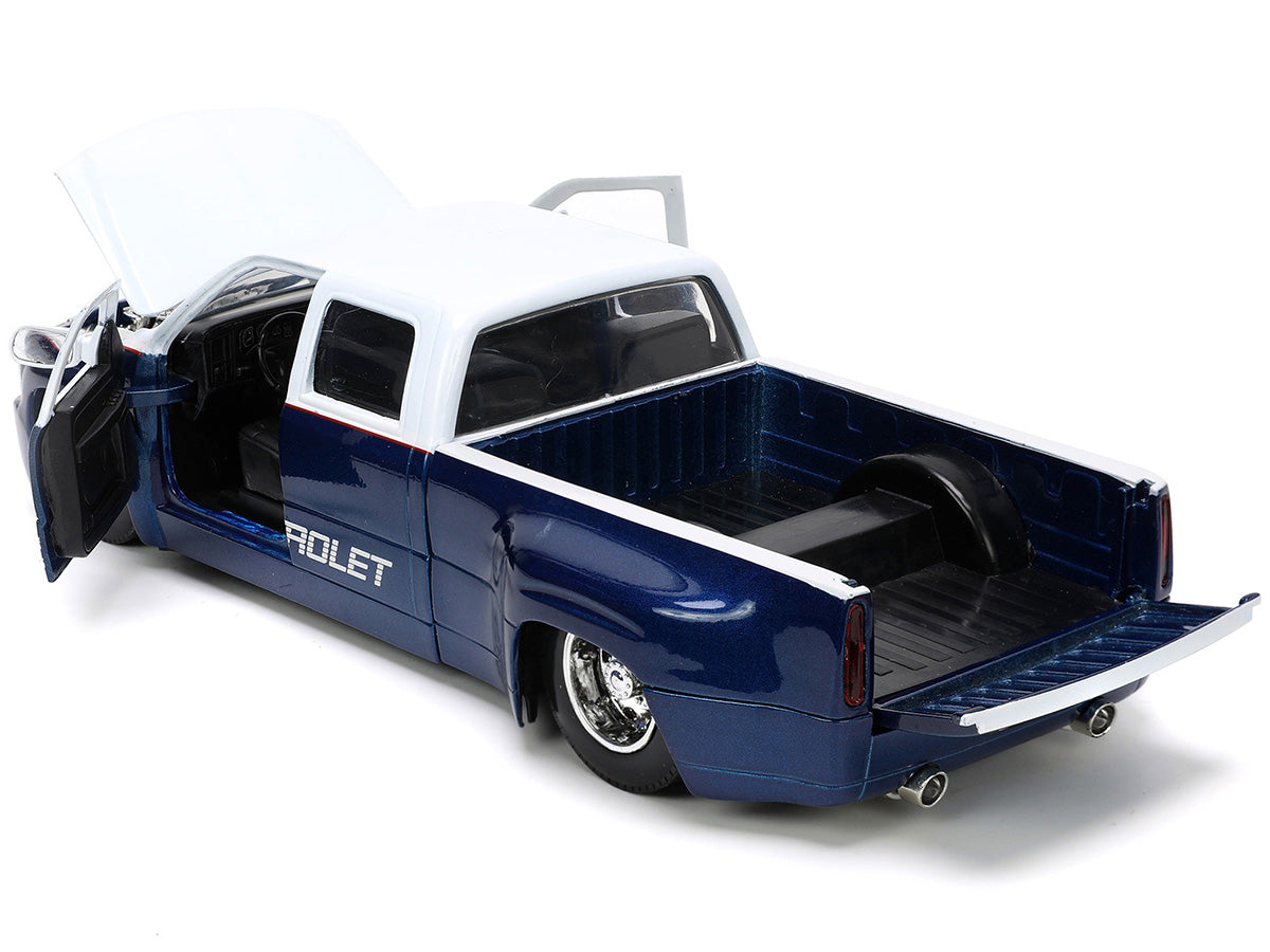 1999 Chevrolet Silverado Dually Pickup Truck Blue Metallic and White with Red Stripes with Extra Wheels "Just Trucks" Series 1/24 Diecast Model Car by Jada