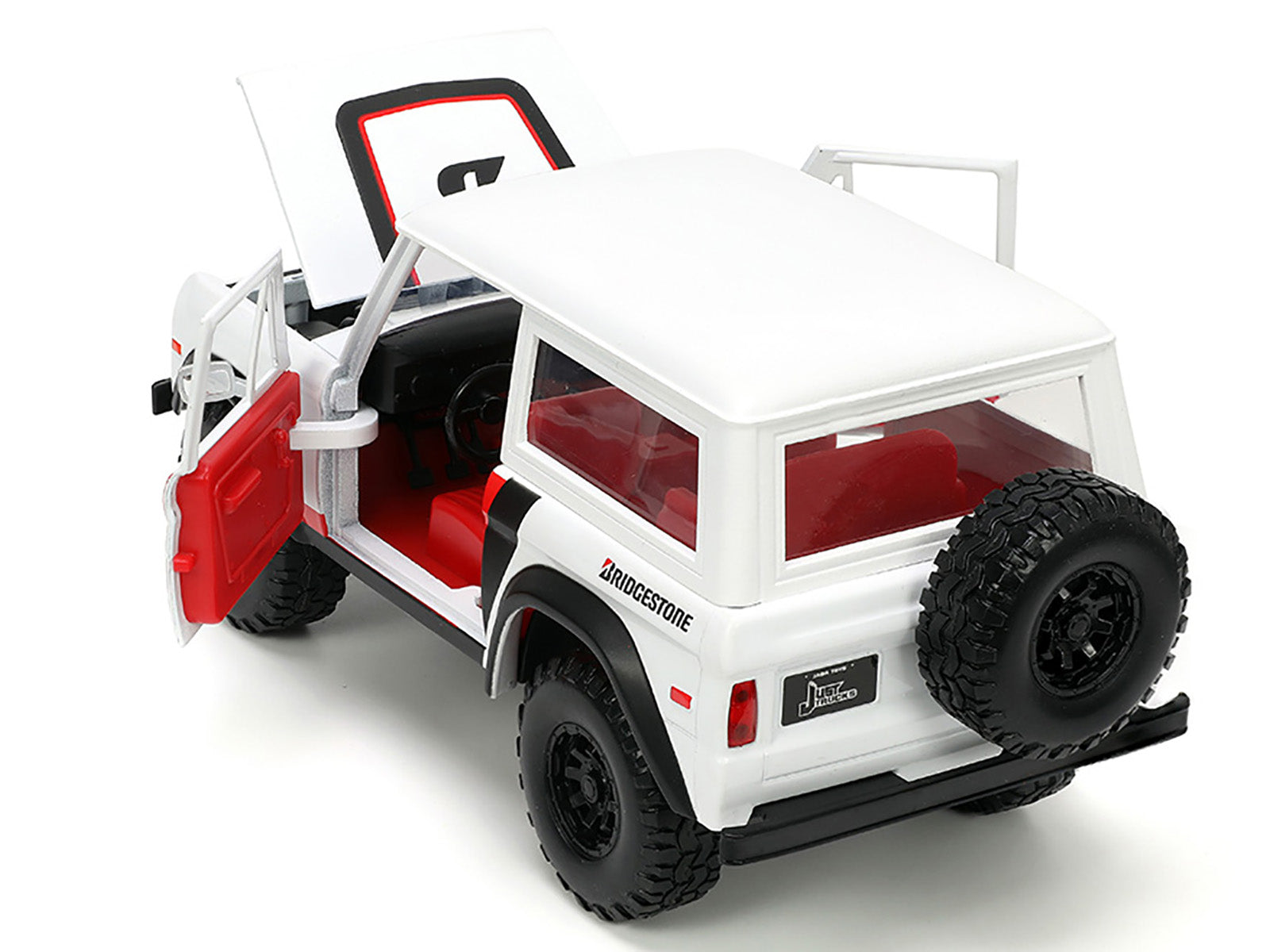 1973 Ford Bronco #008 White with Red and Black Stripes and Red Interior with Extra Wheels "Just Trucks" Series 1/24 Diecast Model Car by Jada
