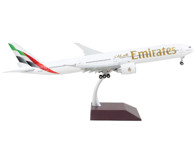 Boeing 777-300ER Commercial Aircraft with Flaps Down "Emirates Airlines - 2023 Livery" White with Striped Tail "Gemini 200" Series 1/200 Diecast Model Airplane by GeminiJets