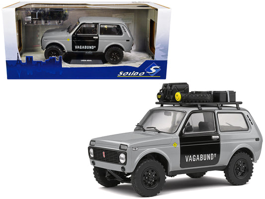 1980 Lada Niva Gray with Black Doors "Vagabund M" with Roof Rack and Accessories 1/18 Diecast Model Car by Solido